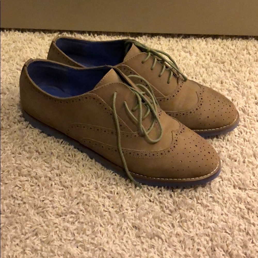 Dress shoes. Stone/purple sole.